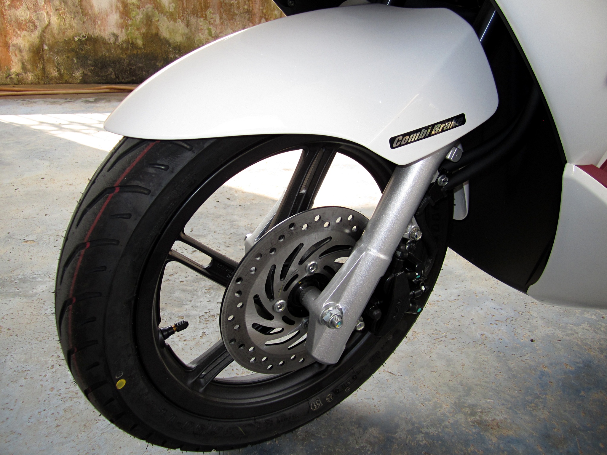 Front wheel of a Honda PCX scooter