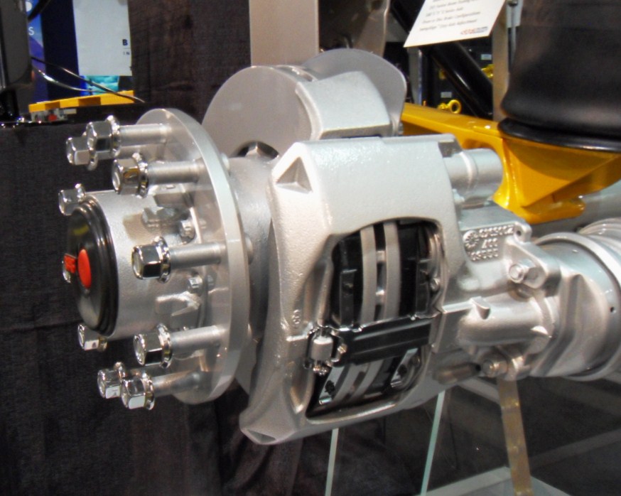 Large vented disc brake rotor and caliper on a vehicle