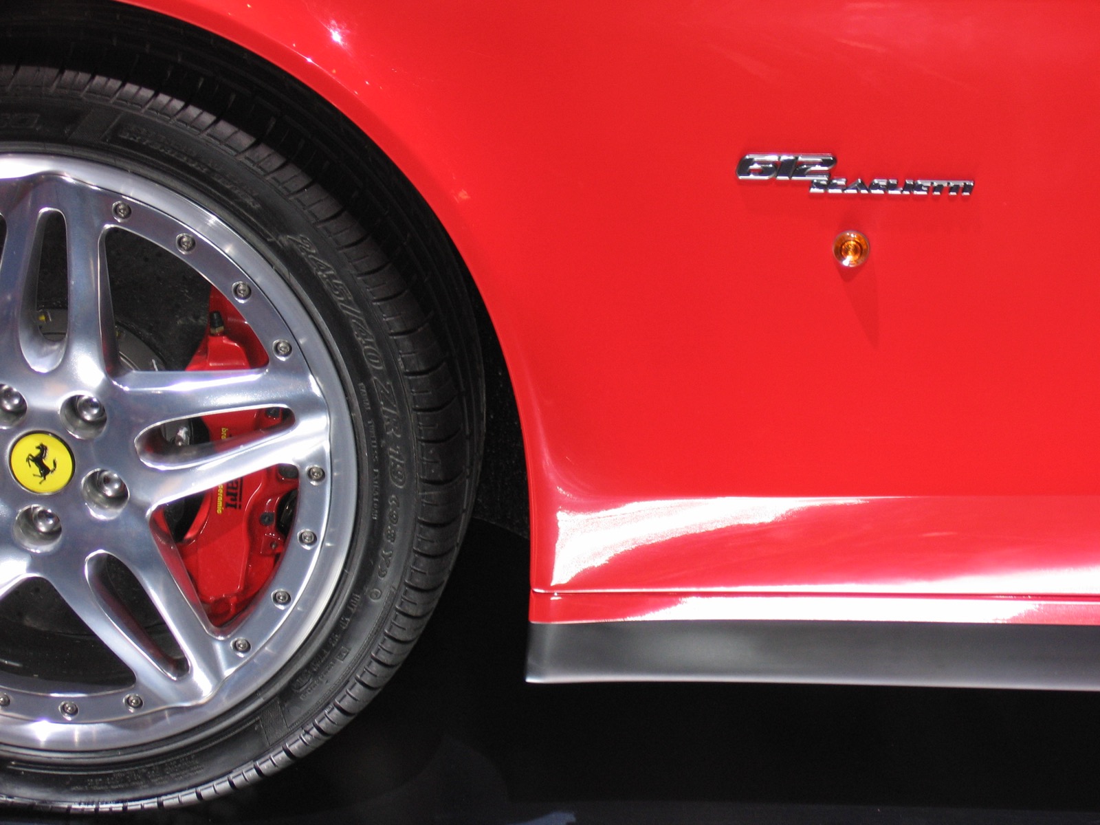 Vented disc brake and multi-piston caliper on a show car wheel