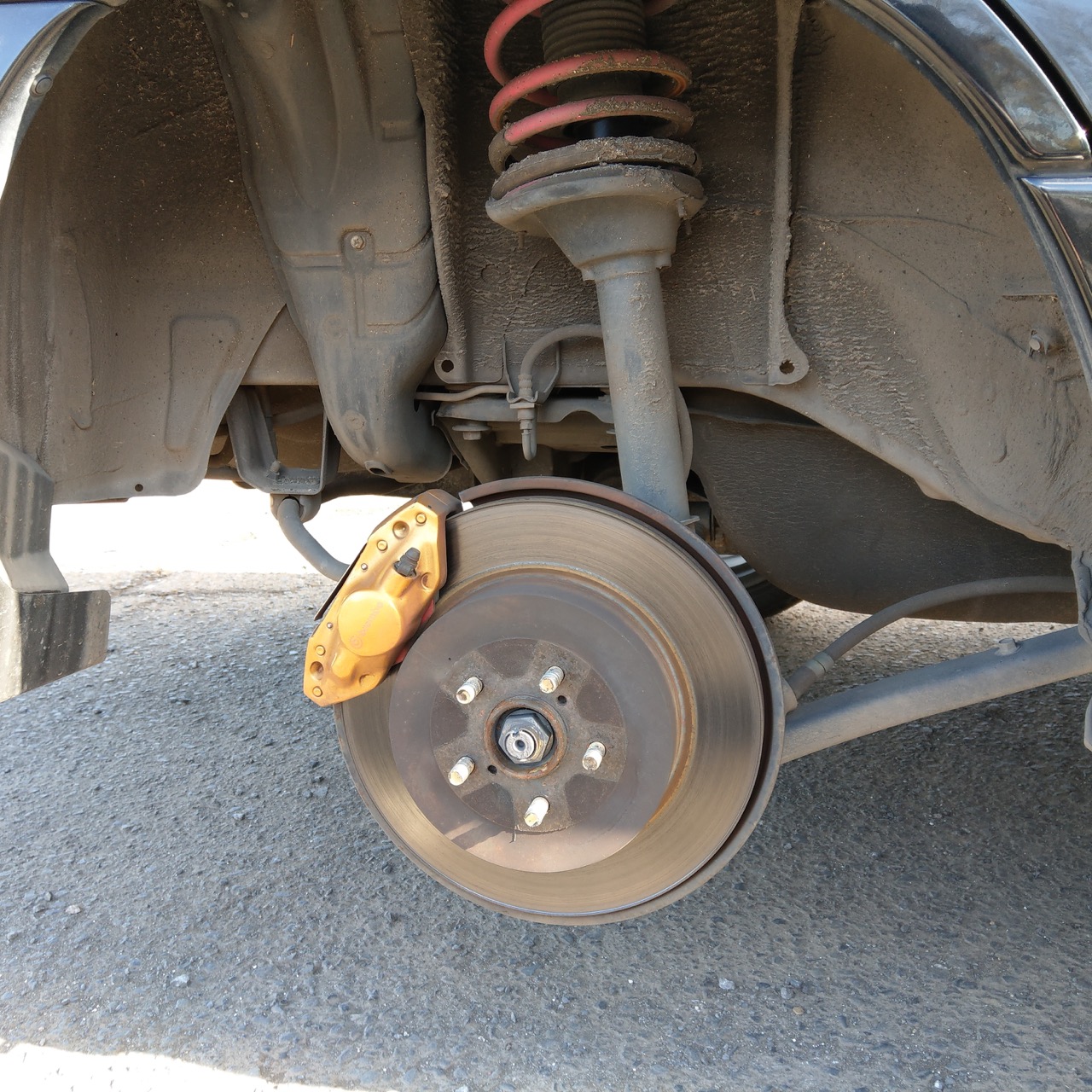 Disc brake rotor and caliper on a Subaru Forester