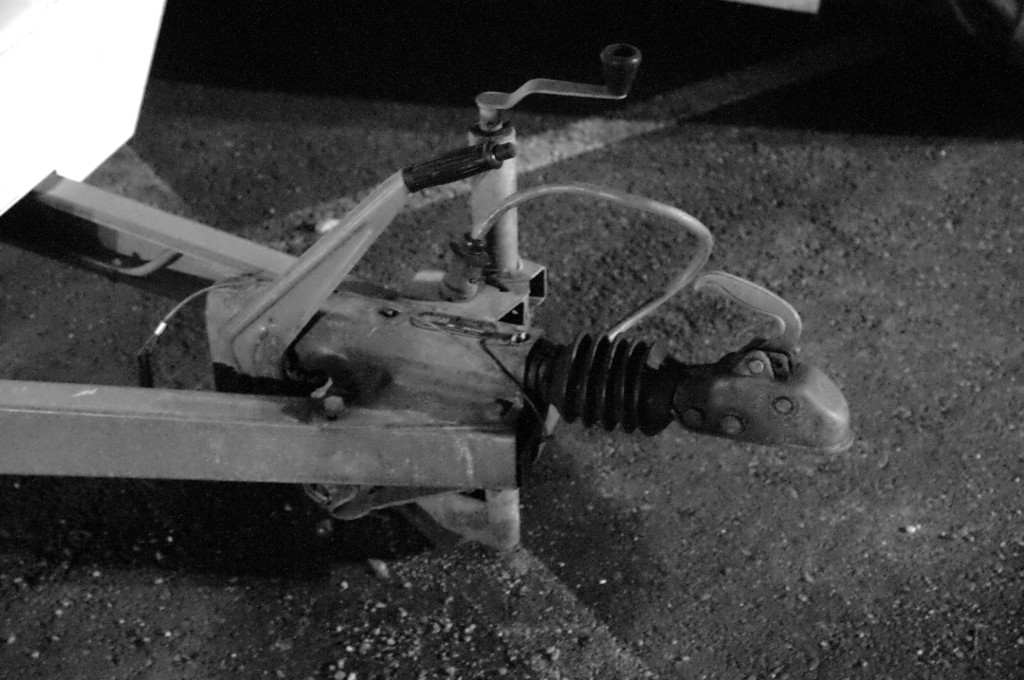 Surge brake coupler assembly on a trailer tongue